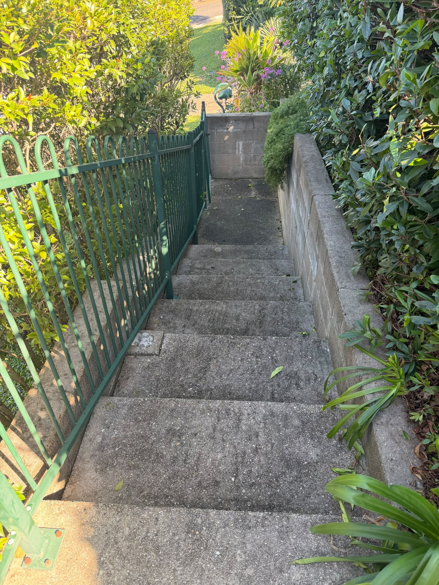 Before pressure washing - Exterior pressure clean for patios, walls and hard surfaces