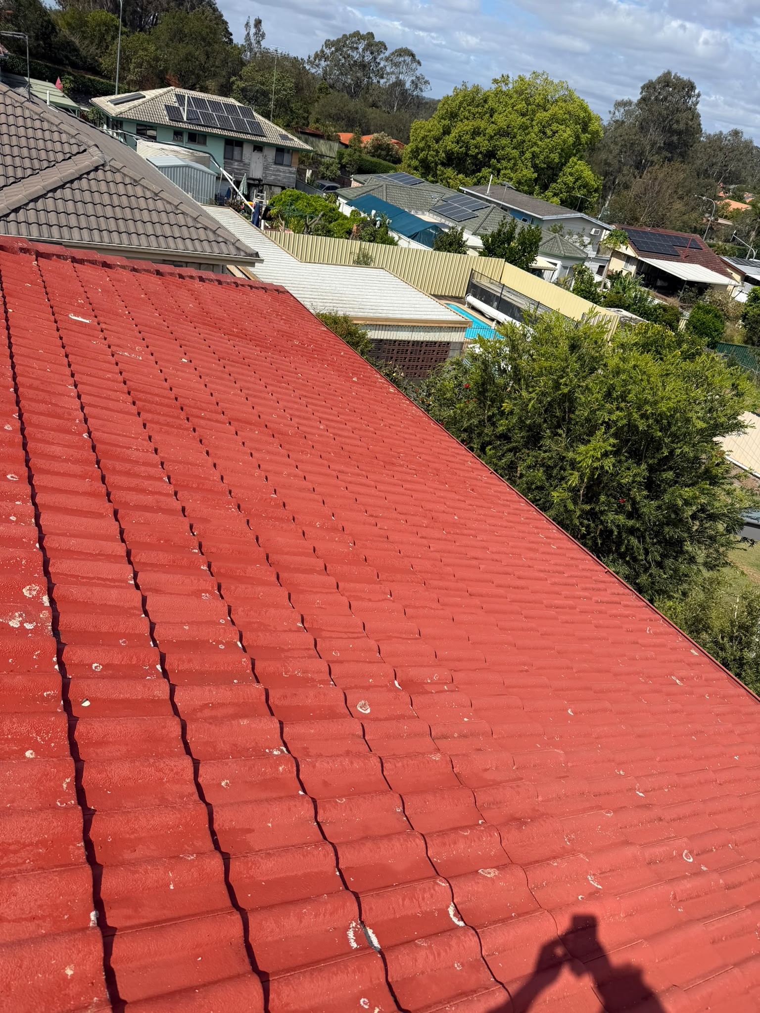 After roof cleaning - Roof surface restored with improved appearance and clearer finish