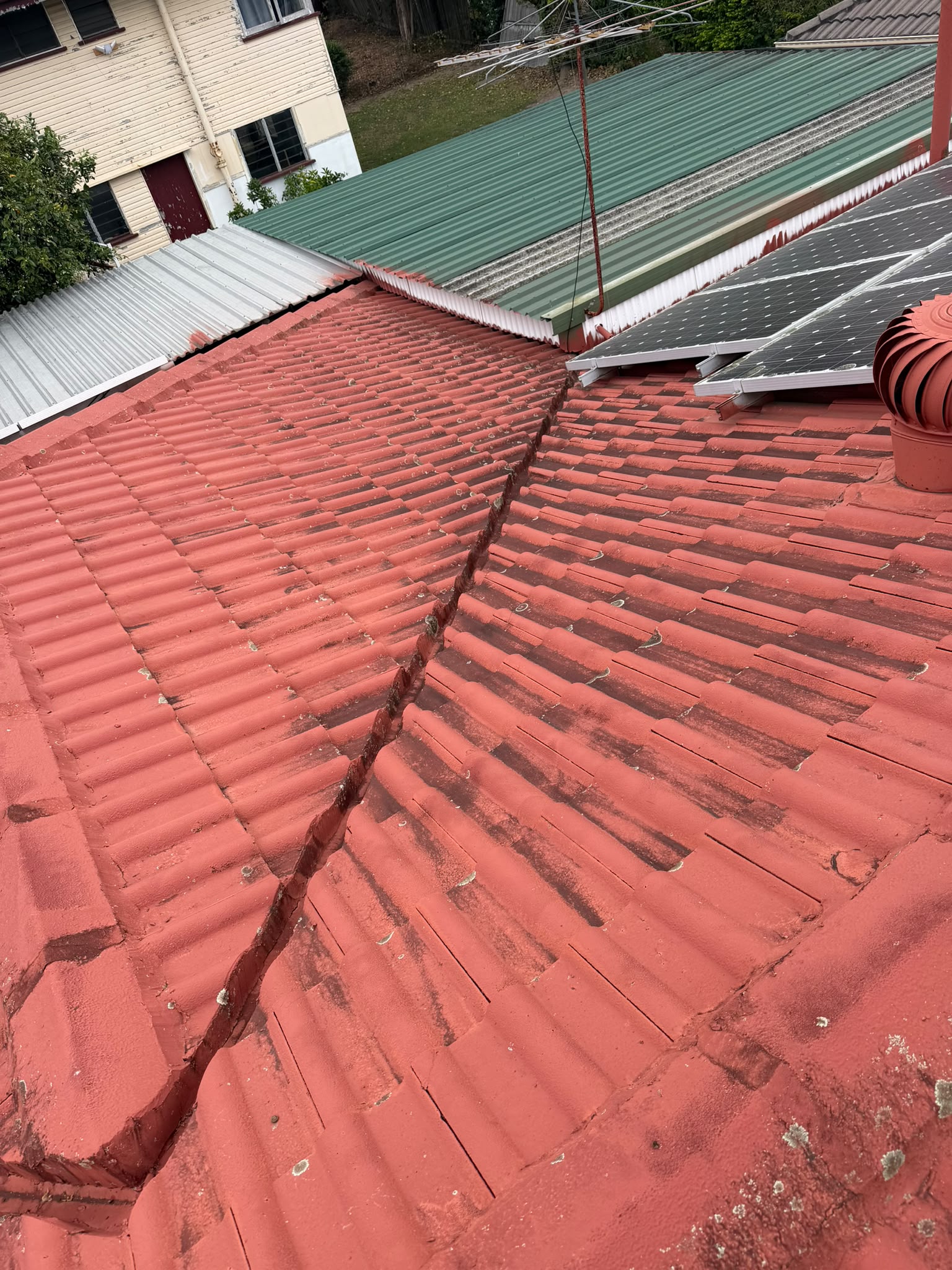 Before roof cleaning - Roof cleaning removing moss and built-up grime